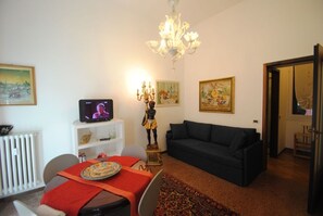 Apartment, 1 Bedroom | Living area | 32-inch LCD TV with digital channels, TV