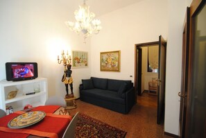 Apartment, 1 Bedroom | Living area | 32-inch LCD TV with digital channels, TV