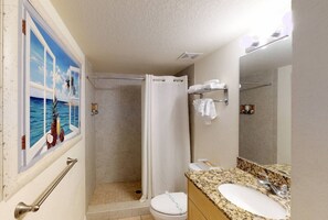 Combined shower/tub, hair dryer, towels, shampoo