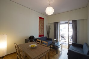 Apartamento | Área de estar | TV de tela plana