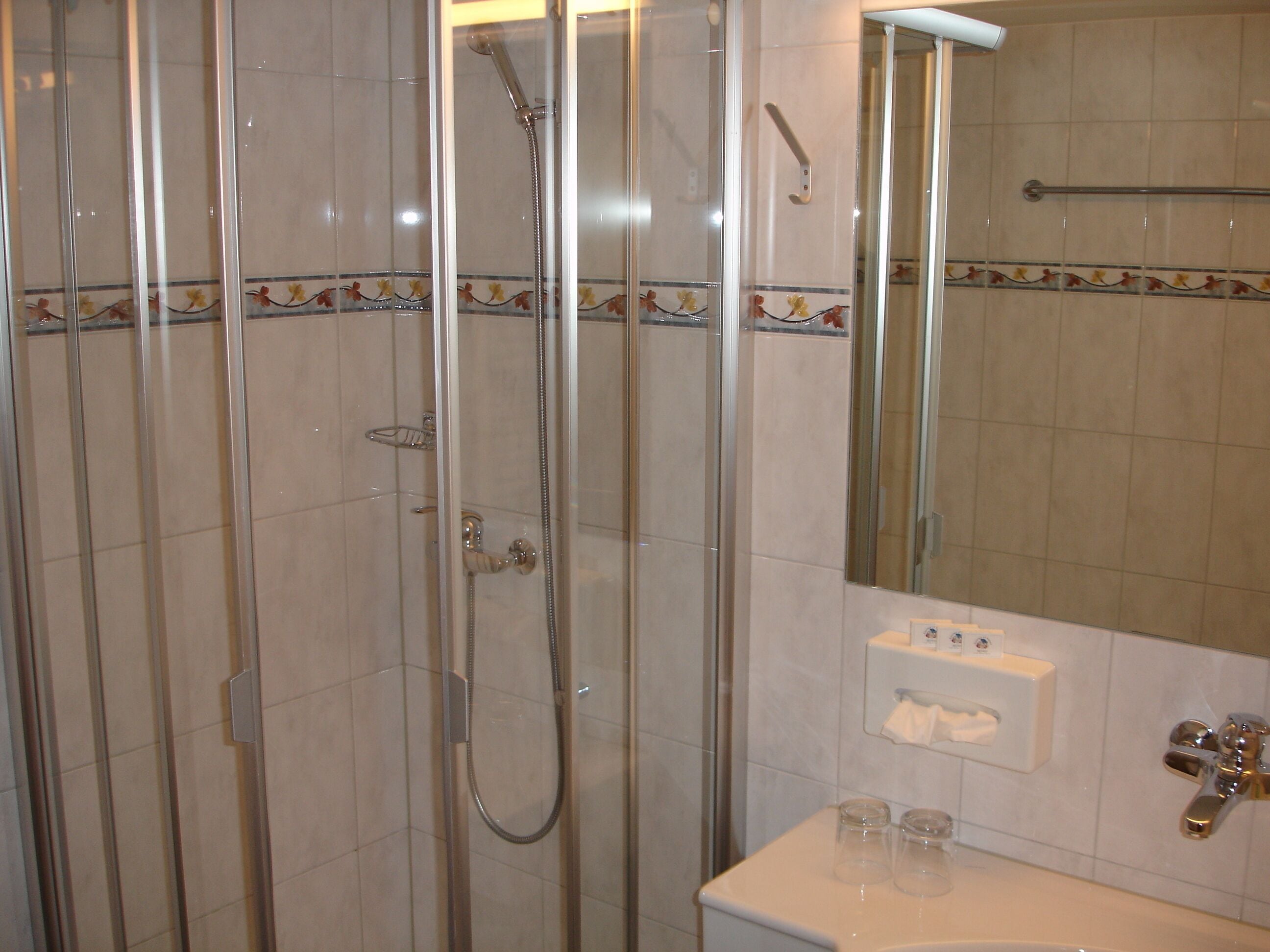 hair dryer, slippers, towels, soap