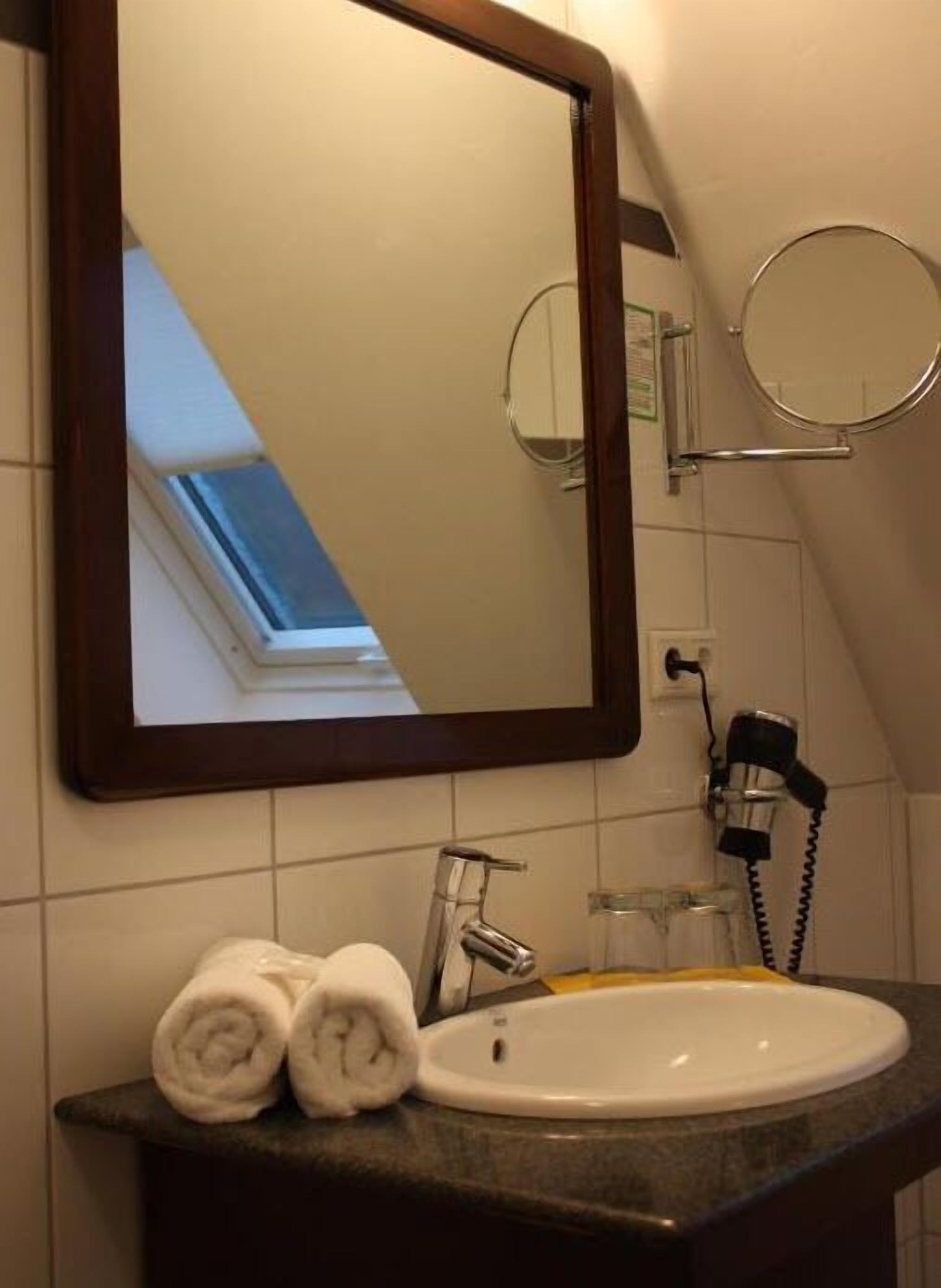 deep-soaking bathtub, free toiletries, hair dryer, towels