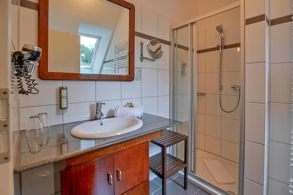 deep-soaking bathtub, free toiletries, hair dryer, towels