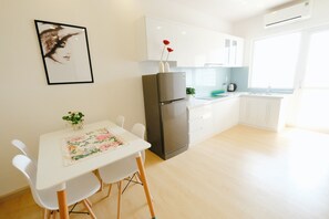 Apartment, Mountain View | Shared kitchen | Fridge, electric kettle, cookware/dishes/utensils - Stay In Nha Trang Apartments (Nha Trang)