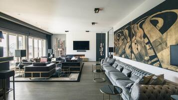 Premium Apartment, 3 Bedrooms | Living area | Flat-screen TV