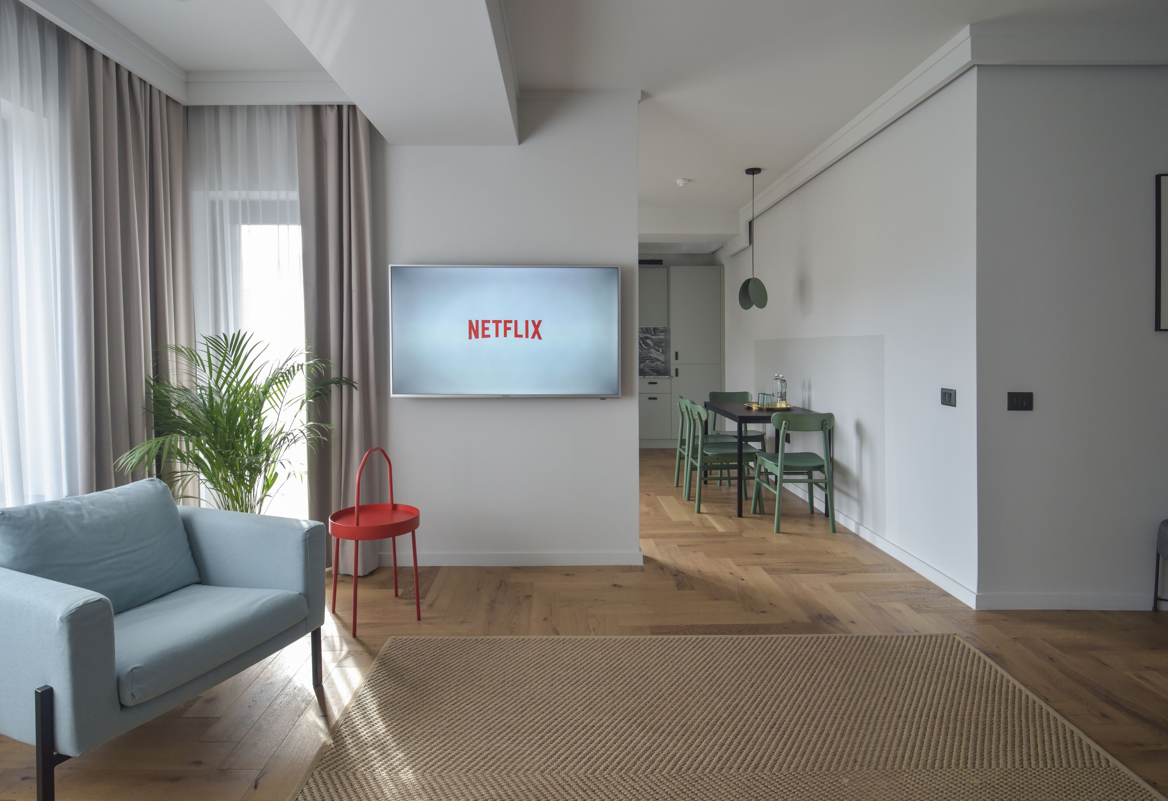 Deluxe Apartment, 2 Bedrooms | Living room | 140-cm Smart TV with cable channels, TV, Netflix