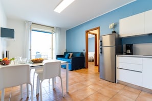 Classic Apartment, 2 Bedrooms | Living area | TV - Summertime Family Resort (San Michele al Tagliamento)