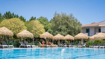 Seasonal outdoor pool, pool umbrellas, pool loungers