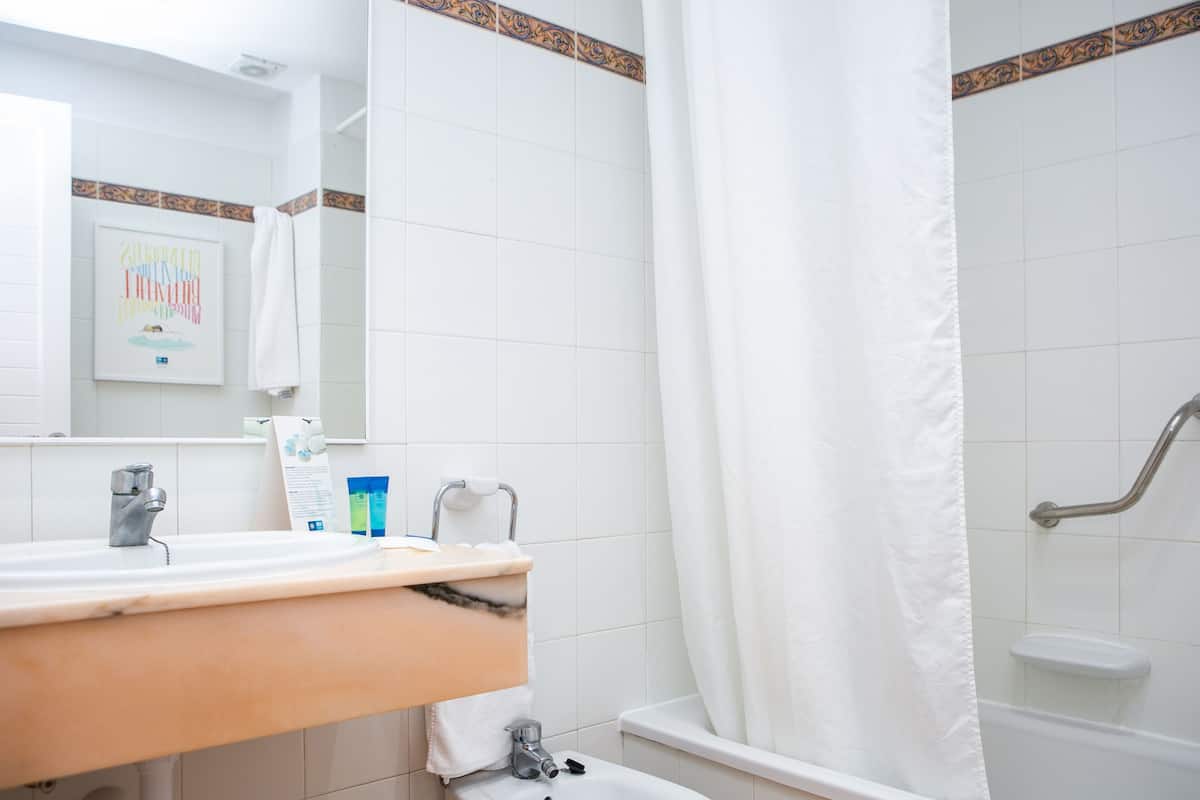 hair dryer, bidet, towels, soap