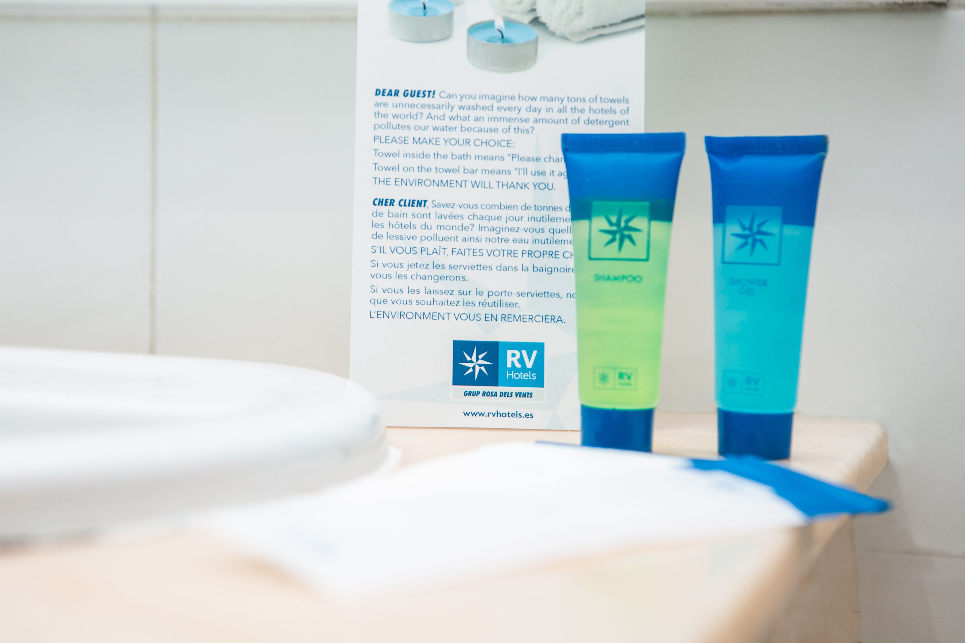 hair dryer, bidet, towels, soap