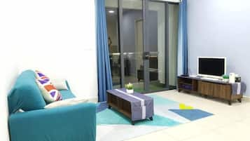 Family Condo, 2 Bedrooms | Living room | 40-inch Smart TV with digital channels, TV