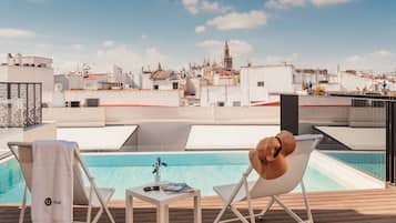 Outdoor pool, open 10:00 AM to 8:00 PM, sun loungers