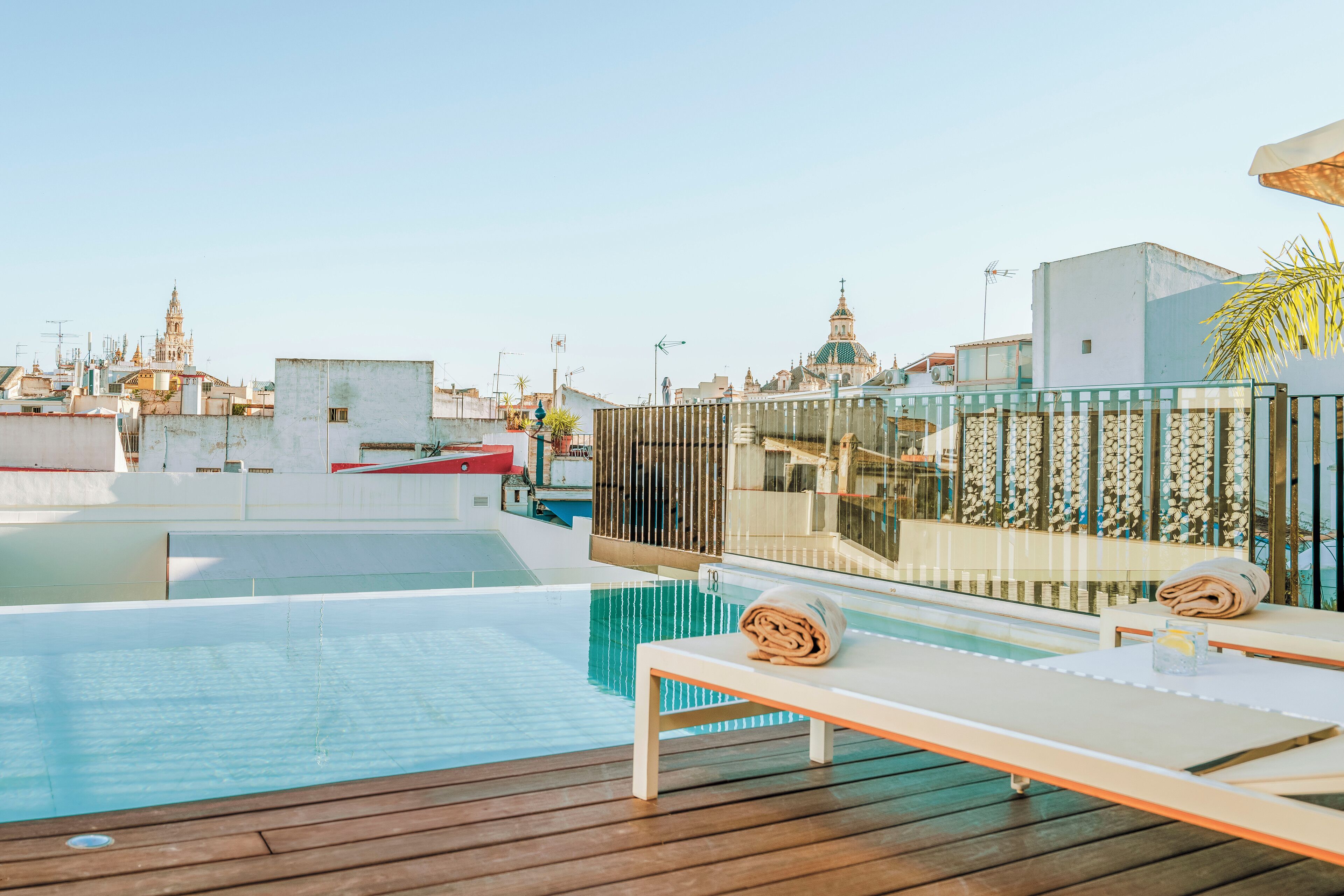 outdoor pool, open 10:00 am to 8:00 pm, pool loungers