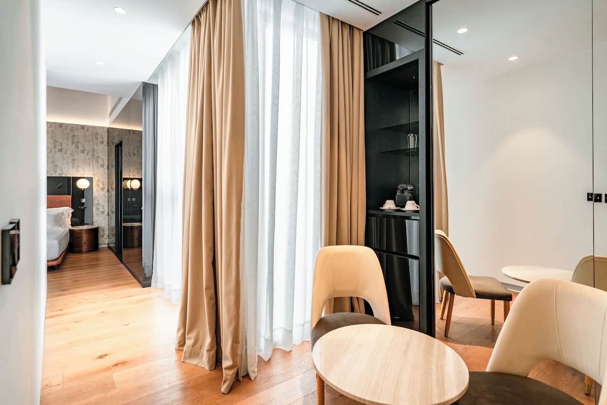 Premium bedding, down comforters, memory foam beds, minibar