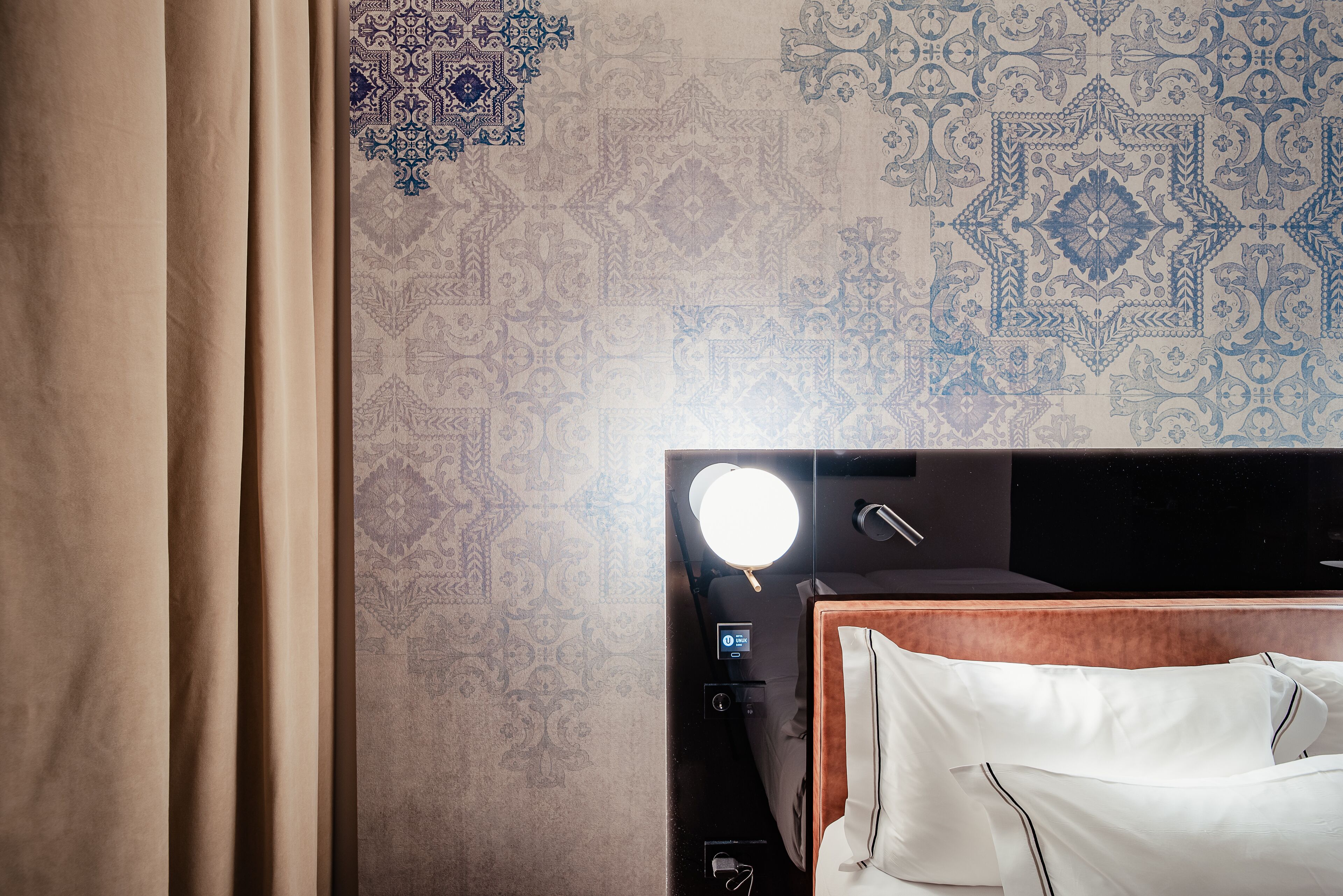 Premium bedding, down comforters, memory foam beds, minibar