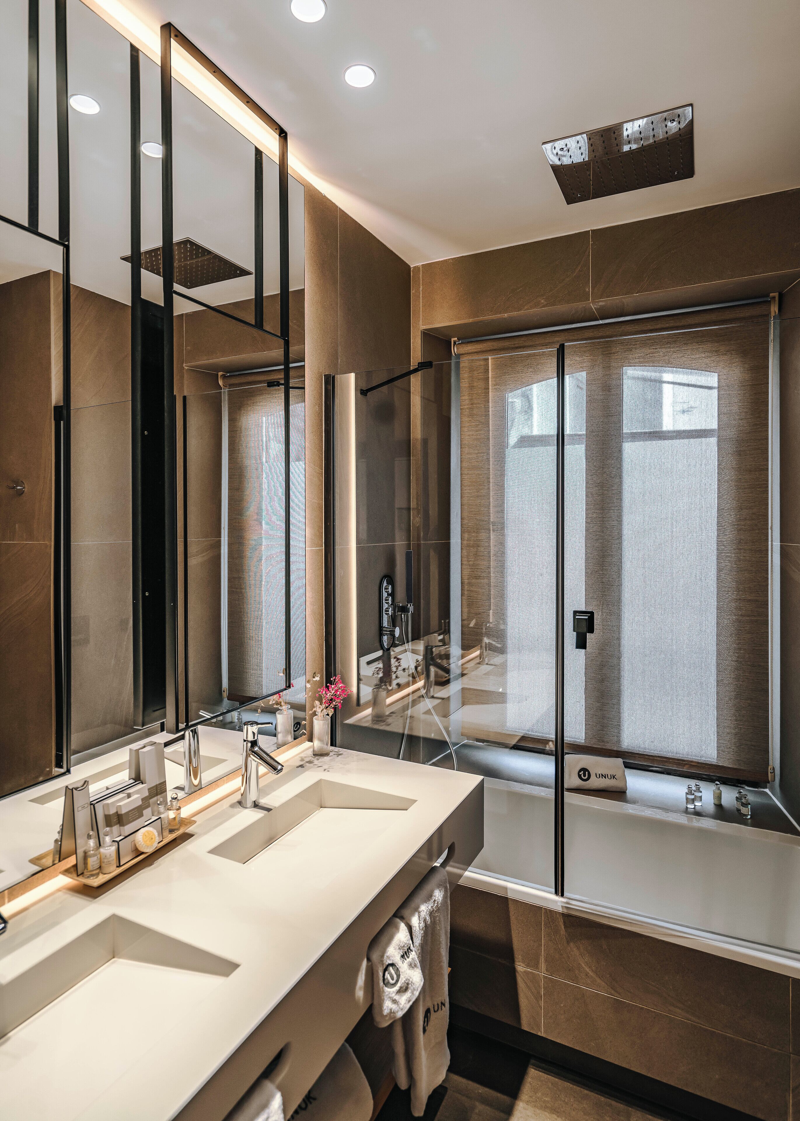 rainfall showerhead, hair dryer, bathrobes, slippers