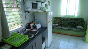 Fridge, microwave, stovetop, coffee/tea maker