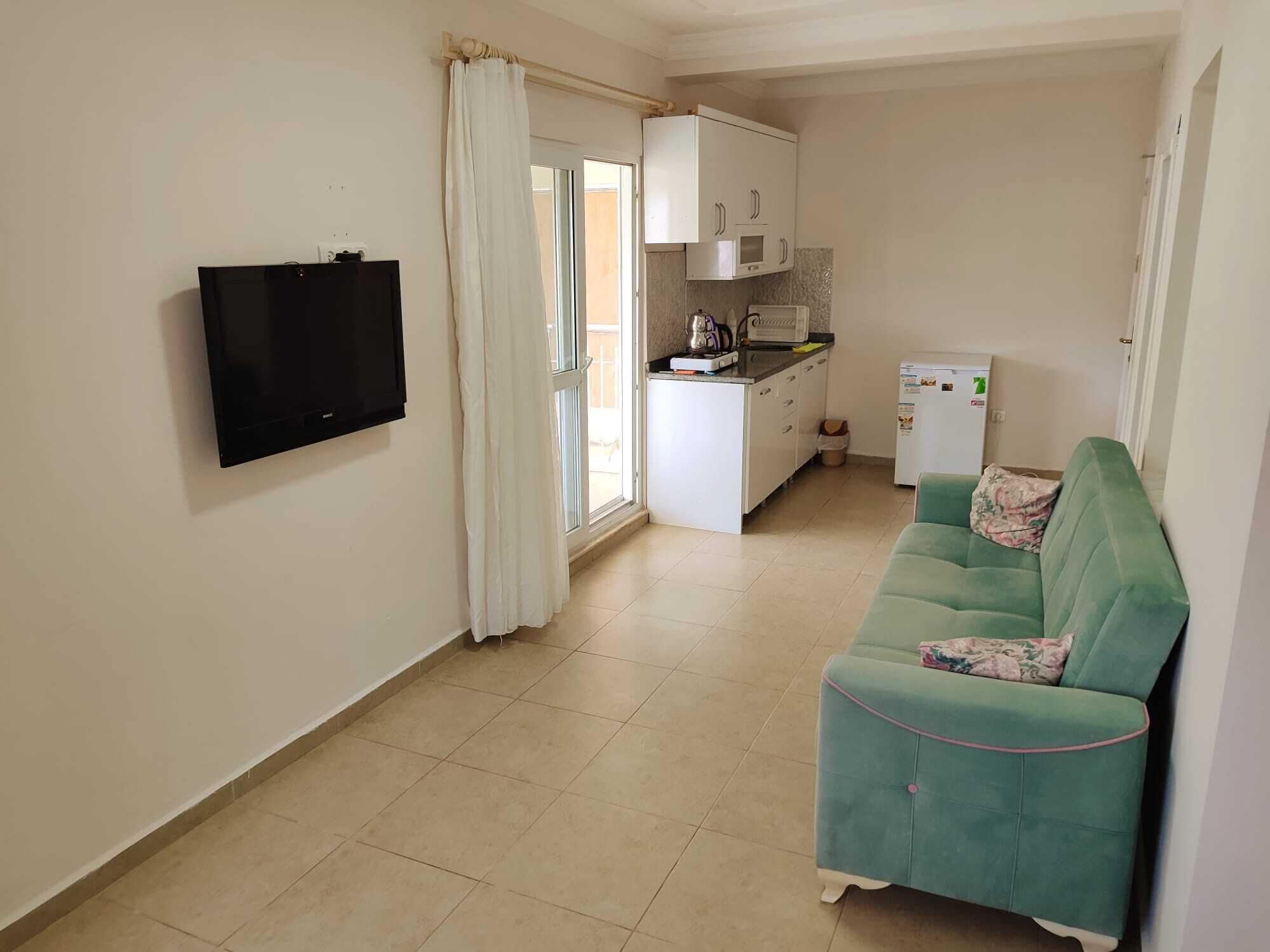 comfort apartment, terrace | living room | lcd tv