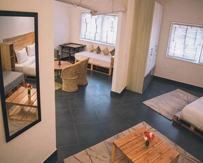 Luxury Suite | Living room | 42-inch LCD TV with satellite channels, TV, fireplace - Classy Residency (New Delhi)