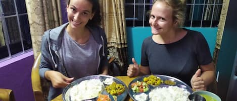 Guests are ready for dinner (Nepali Daal bhat)