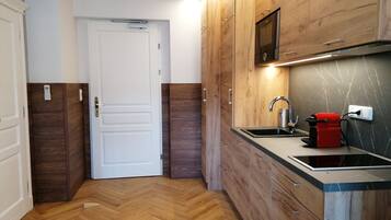 Deluxe Apartment (Top 31) | Living area | 110-cm flat-screen TV with digital channels, Smart TV