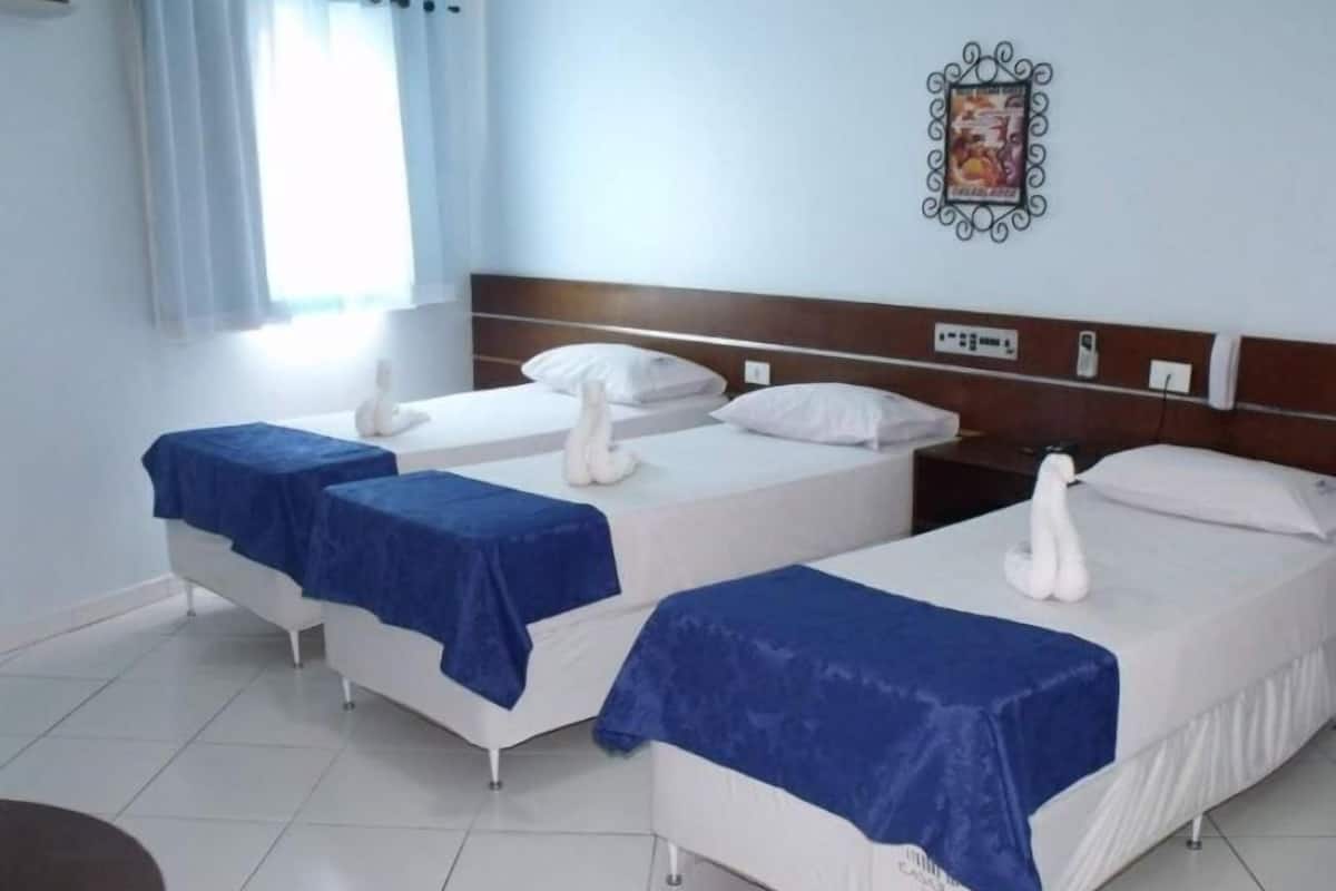 Triple Room, 3 Single Beds | Minibar, free WiFi, bed sheets