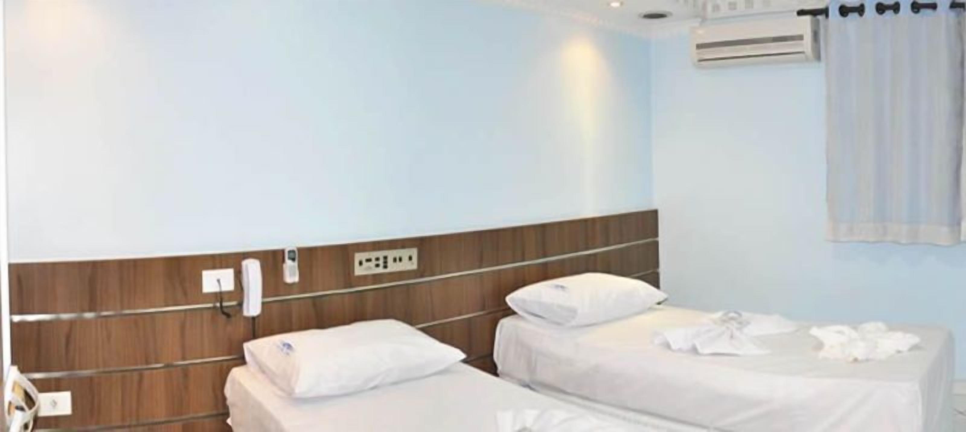 雙床房, 2 張單人床 | 迷你吧、免費無線上網、床單