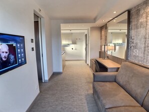 Junior Suite, 2 Bedrooms, Lake View | Living area | Flat-screen TV, heated floors