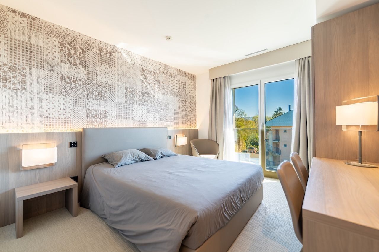 Familiesuite | Premium-sengetøj, skrivebord, mørklægningsgardiner, gratis Wi-Fi