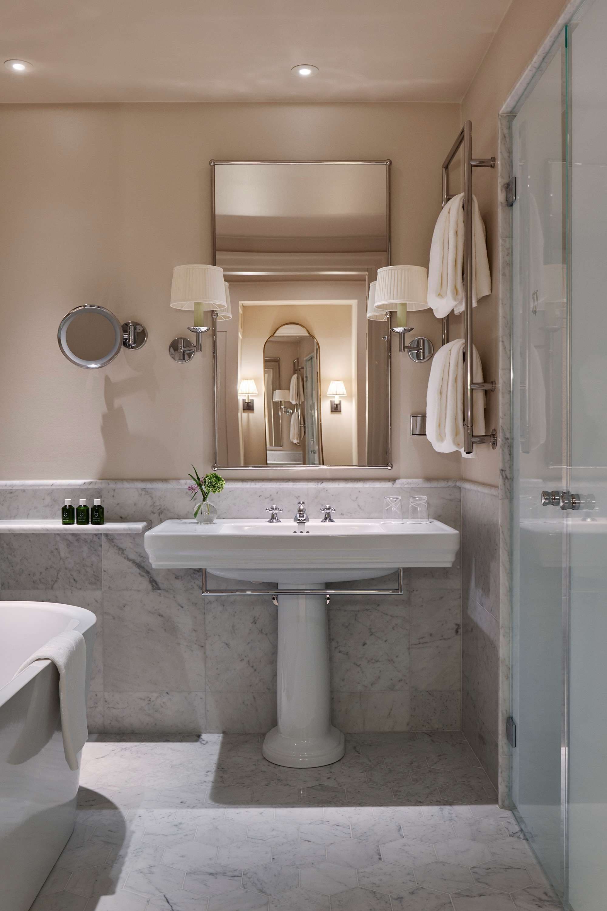 rainfall showerhead, designer toiletries, hair dryer, bathrobes