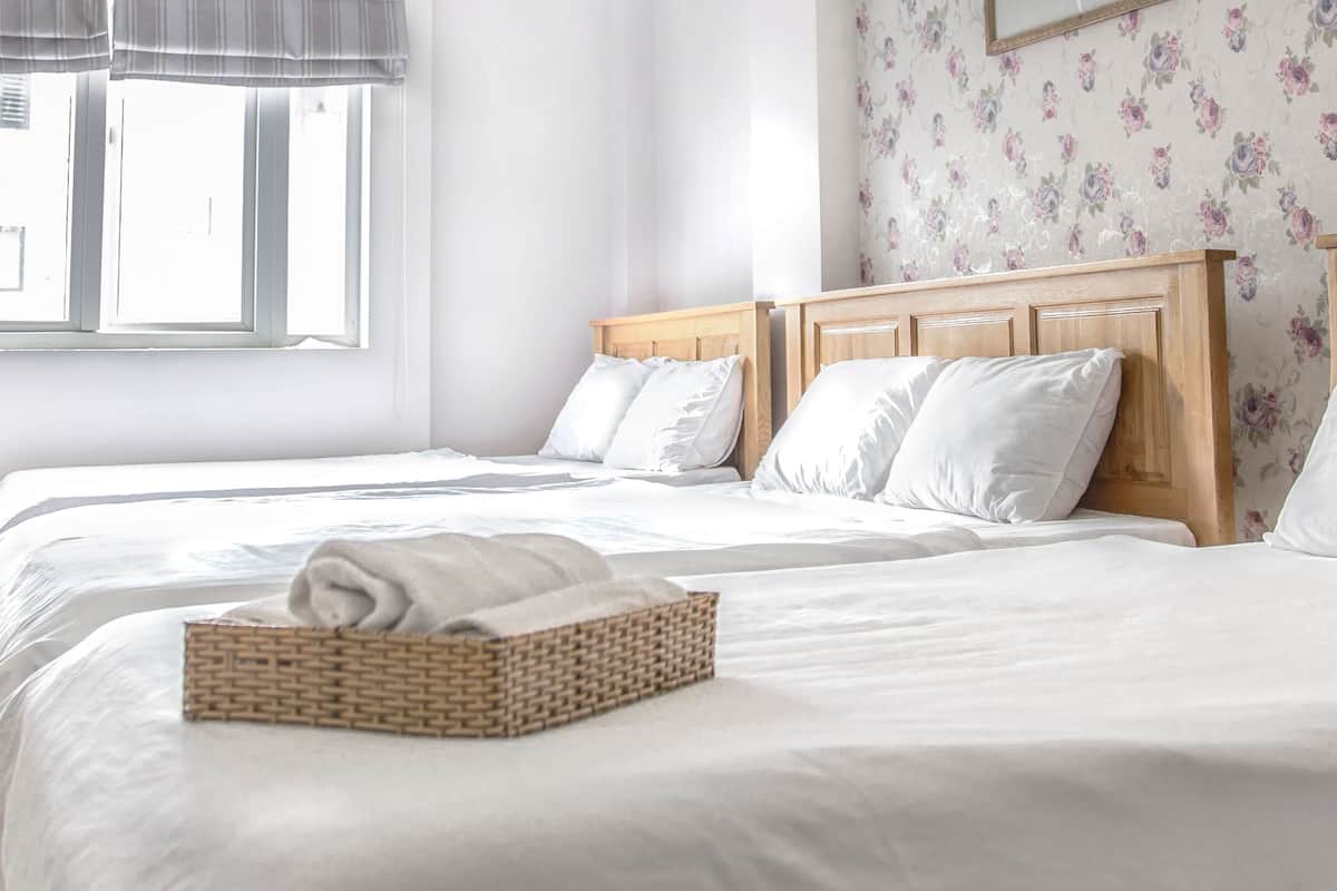 Family Room | Minibar, desk, blackout curtains, iron/ironing board