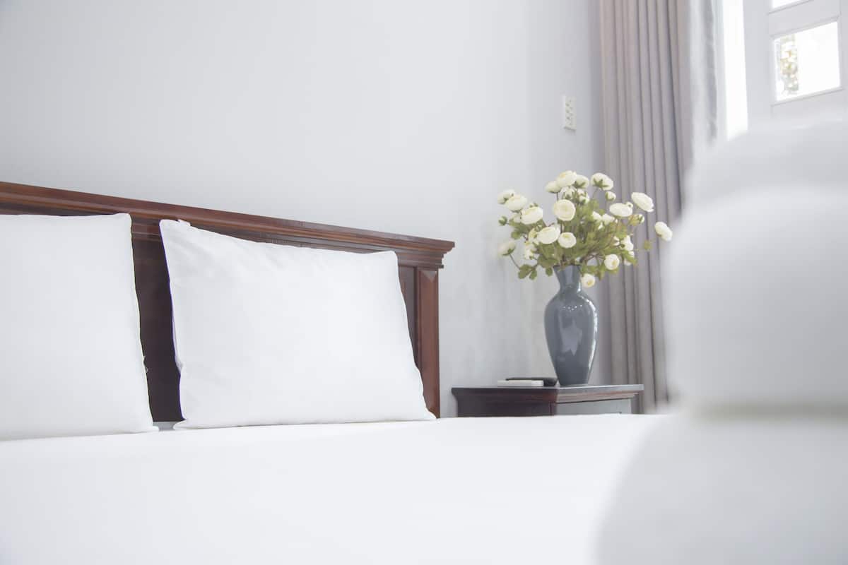 Minibar, desk, blackout curtains, iron/ironing board