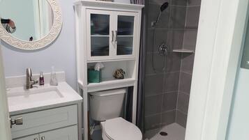 Shower, towels, toilet paper