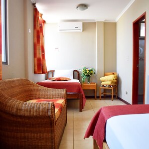 Quarto premium | 1 quarto, espaço de trabalho para notebook, Wi-Fi de cortesia