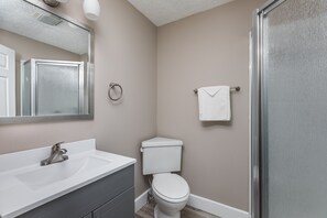 Combined shower/tub, hair dryer, towels, soap