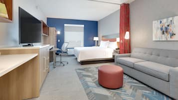 Hypo-allergenic bedding, desk, laptop workspace, blackout curtains