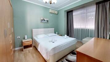 Family Apartment, 1 Bedroom, Non Smoking, City View | Minibar, individually furnished, desk, blackout drapes