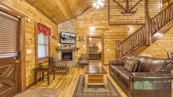 42-inch TV with cable channels, fireplace