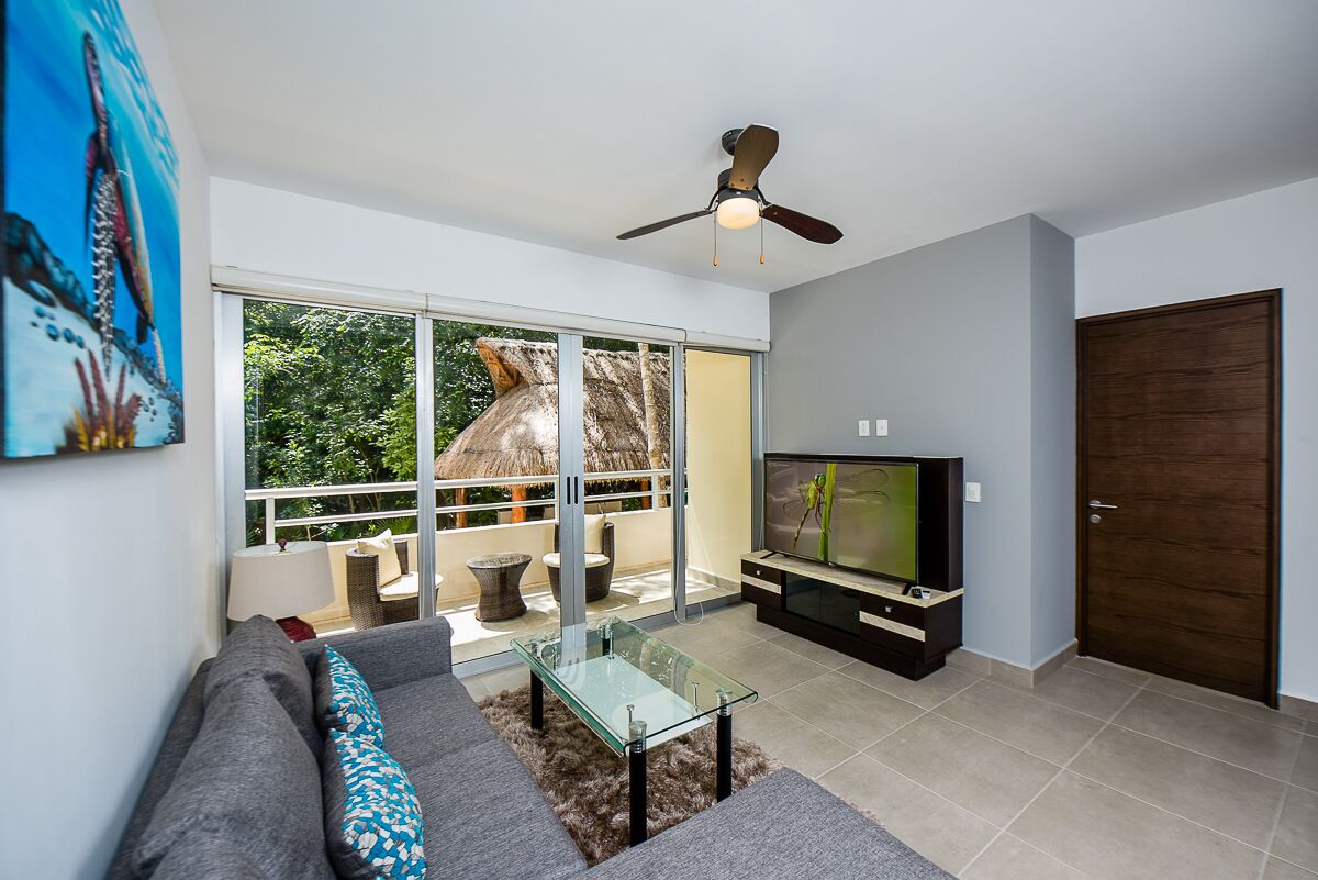 Modern Condo in Gated Comm. Pool, WiFi in Gorgeous Tropical & Tranquil Setting