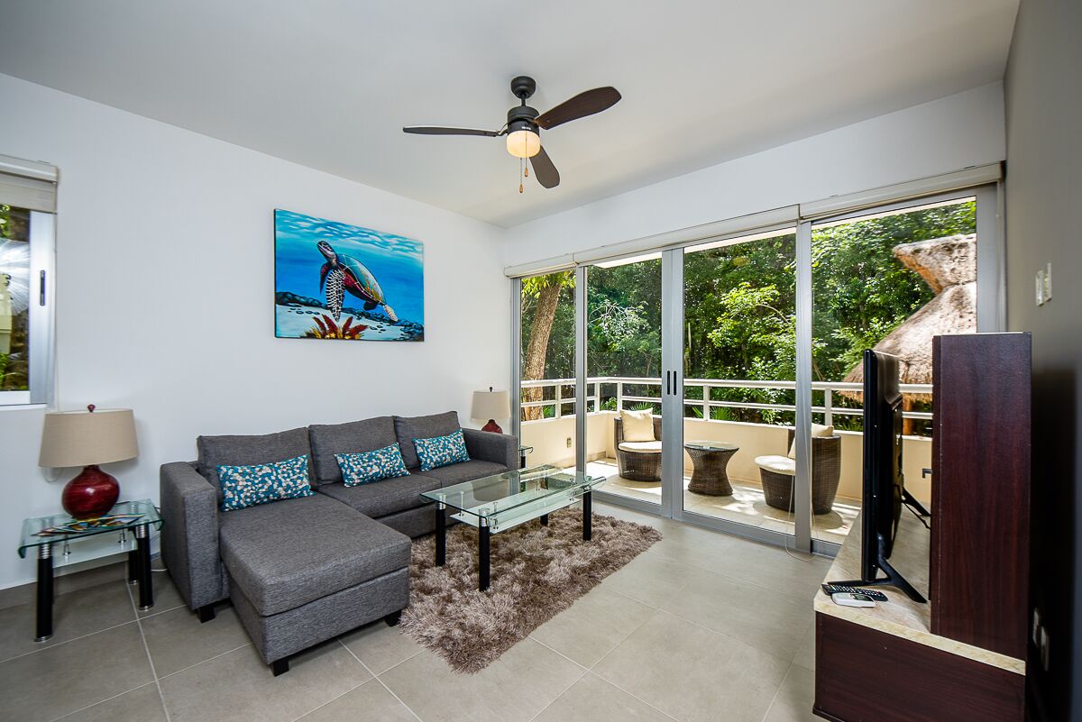 Modern Condo in Gated Comm. Pool, WiFi in Gorgeous Tropical & Tranquil Setting
