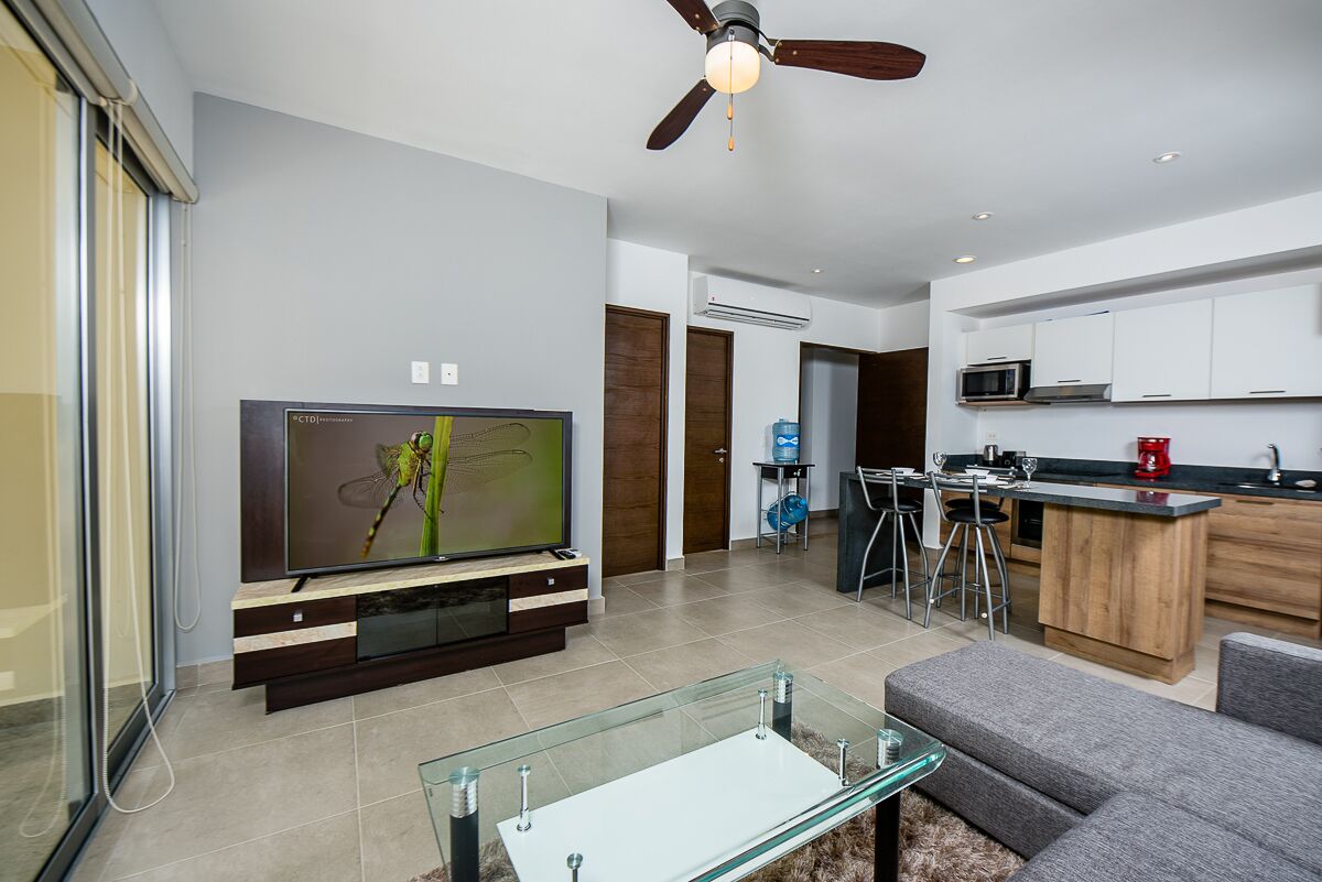 Modern Condo in Gated Comm. Pool, WiFi in Gorgeous Tropical & Tranquil Setting