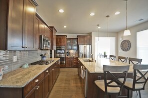 Fridge, microwave, oven, stovetop - Coastal Style 5 Bedroom, 4.5 Bath Home 1 mile from Bethany Beach! Pool, Fitness Center, Multi Sport Court, Sauna, Weekend Shuttle! (Ocean View)