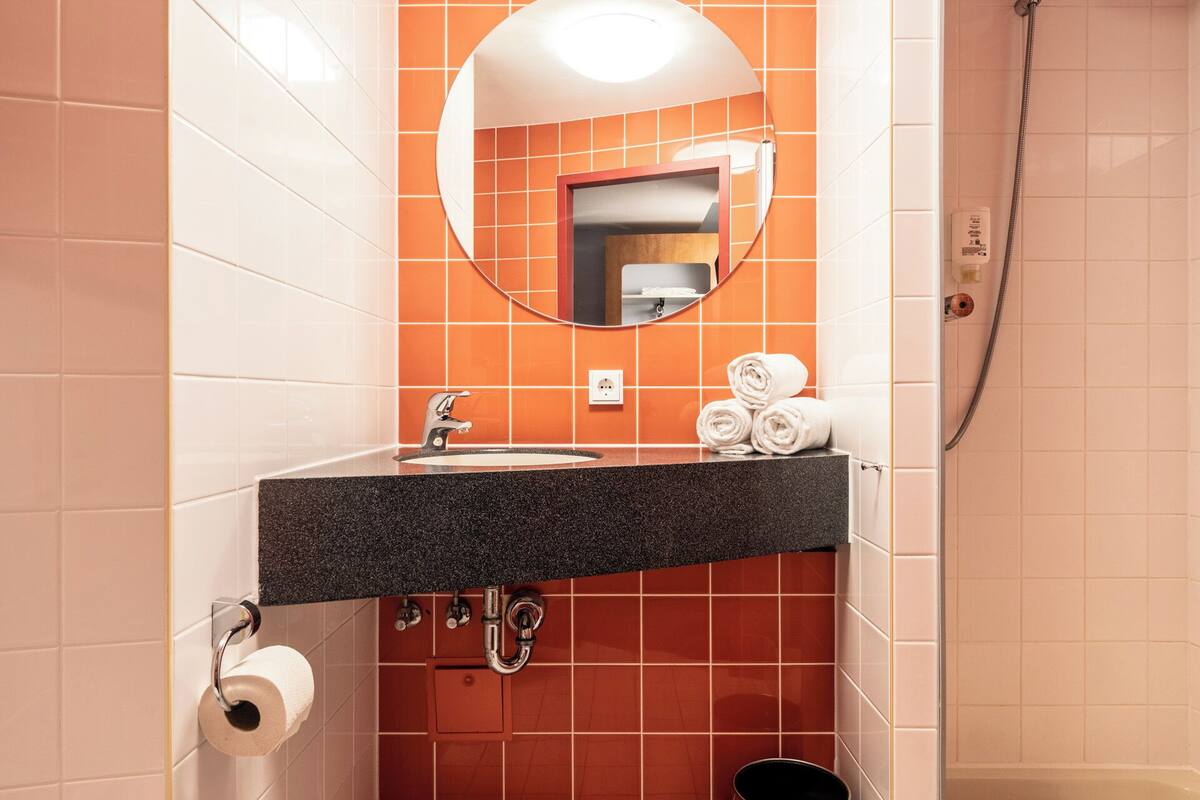 shower, towels, soap, toilet paper