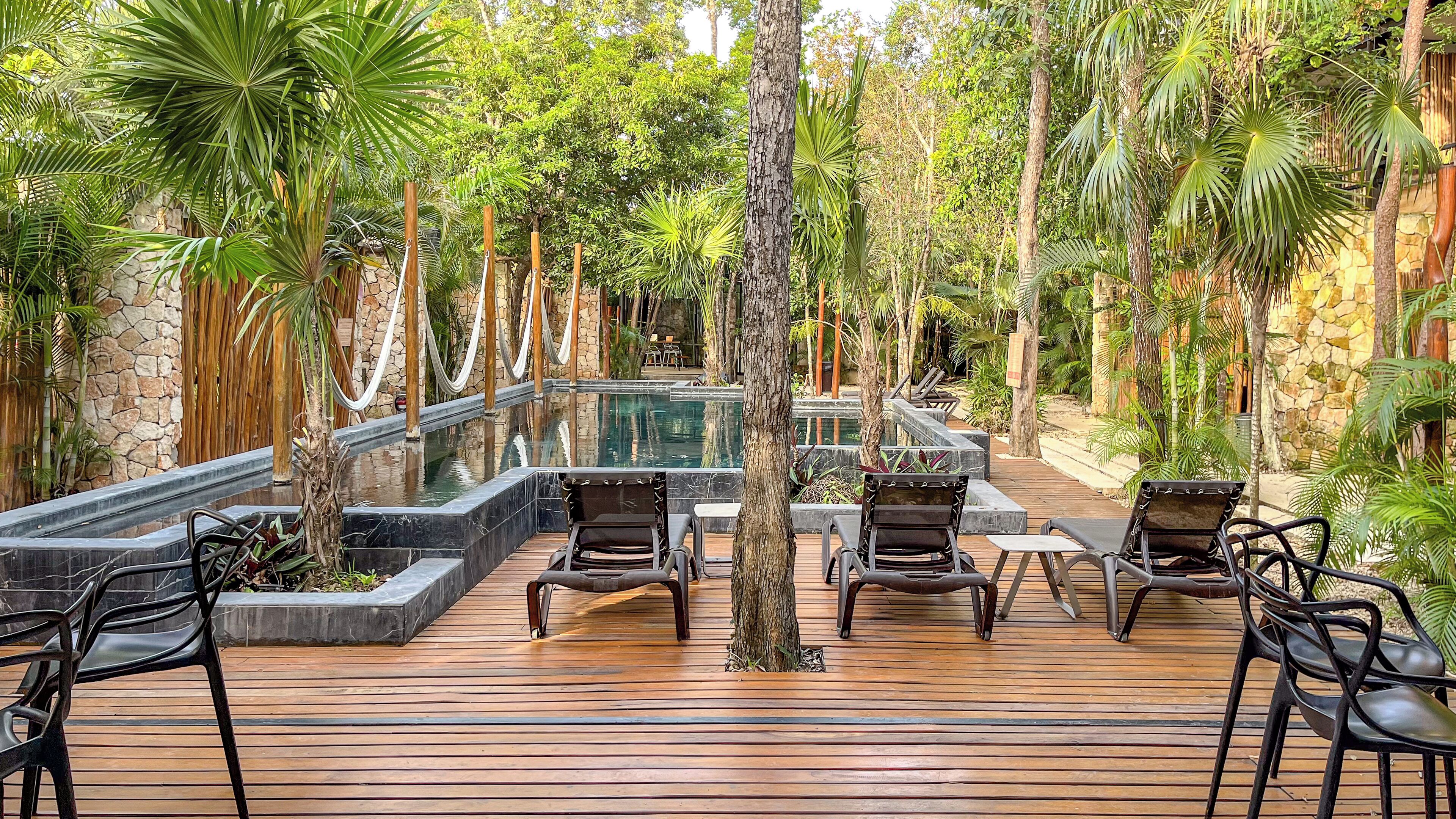 outdoor pool, open 9:00 am to 9:00 pm, pool loungers