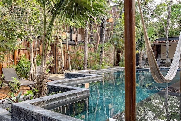 Outdoor pool, open 9:00 AM to 9:00 PM, sun loungers