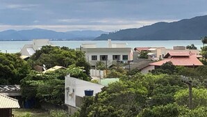 A coastal town with buildings and a view of the sea.