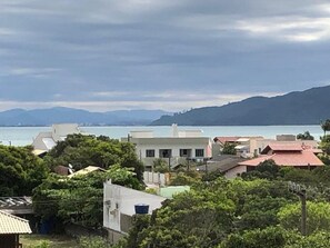 Stunning coastal views of the sea and distant mountains.