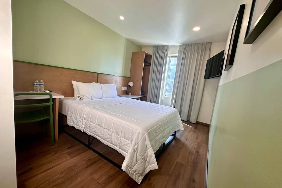 Habitación Confort, 1 cama Queen size | 1 habitación, ropa de cama de alta calidad y edredón