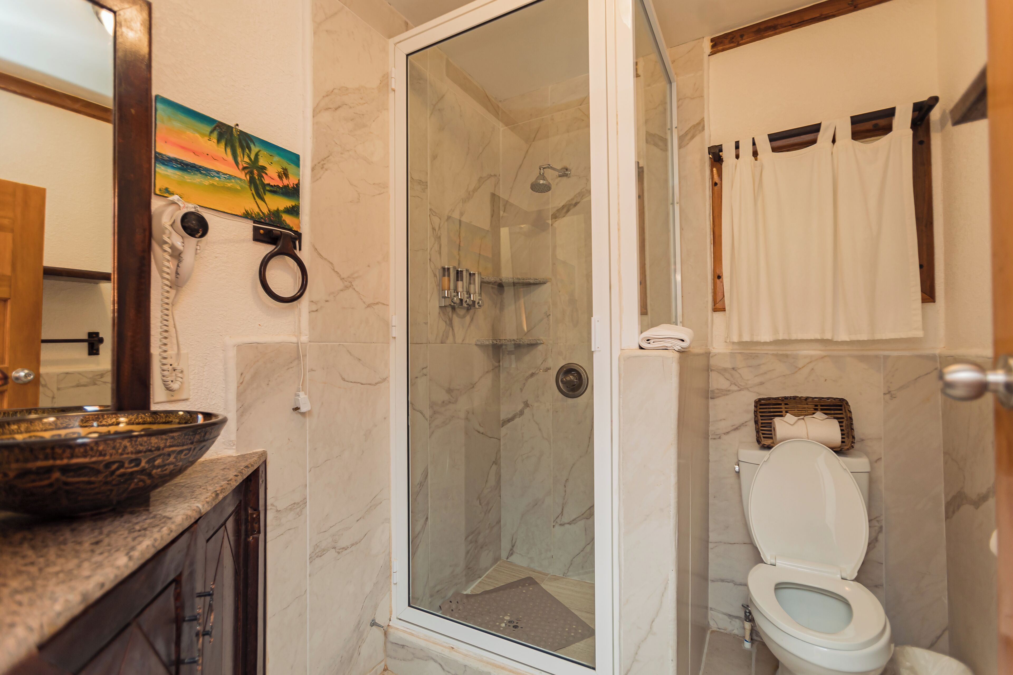 stone house room | bathroom | shower, hair dryer, towels, soap
