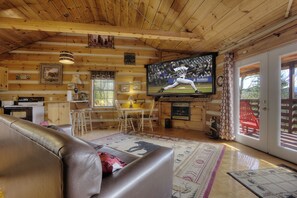 42-inch TV with cable channels, fireplace